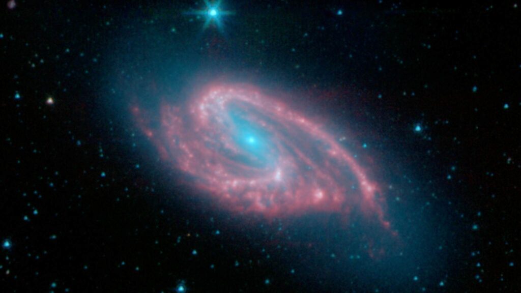 JWST revela rastro de buraco negro atravessando galáxia distante (Imagem: NASA/JPL-Caltech/R)
