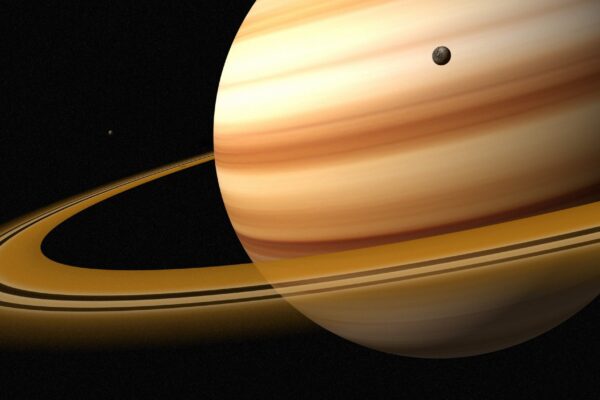 Impacto entre luas antigas explica órbitas e superfície de Titã (Imagem: Photo Images via Canva)