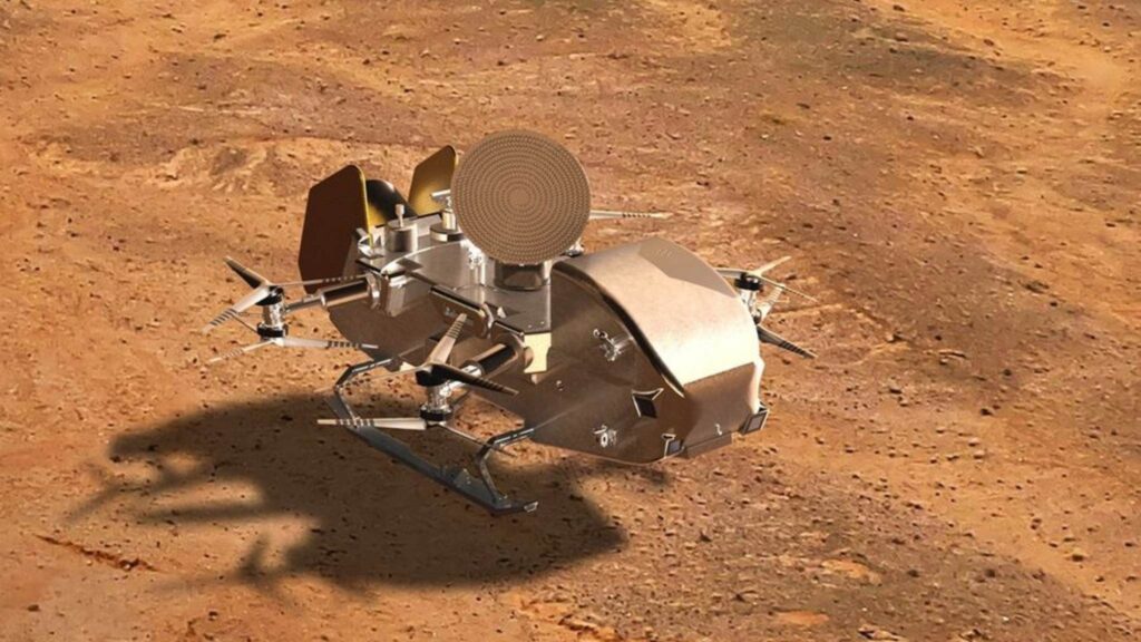 Conceito da Dragonfly da NASA explorando a superfície da lua Titã (Imagem: NASA/Johns Hopkins APL/Steve Gribben)