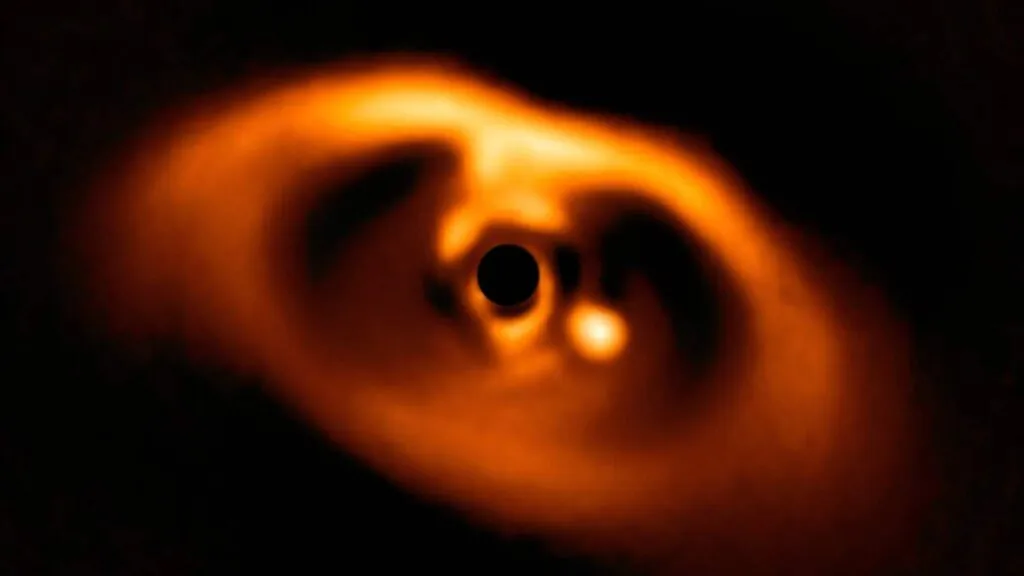 Imagem do VLT/SPHERE mostra planeta em formação como ponto brilhante próximo à estrela mascarada (Imagem: ESO/A. Müller et al., CC BY 4.0)