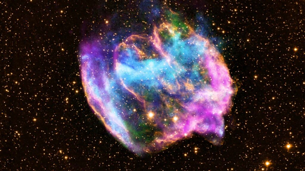 Imagem revela remanescente da supernova W49B na Via Láctea (Imagem: NASA/CXC/MIT/L.Lopez et al; Infravermelho: Palomar; Rádio: NSF/NRAO/VLA)