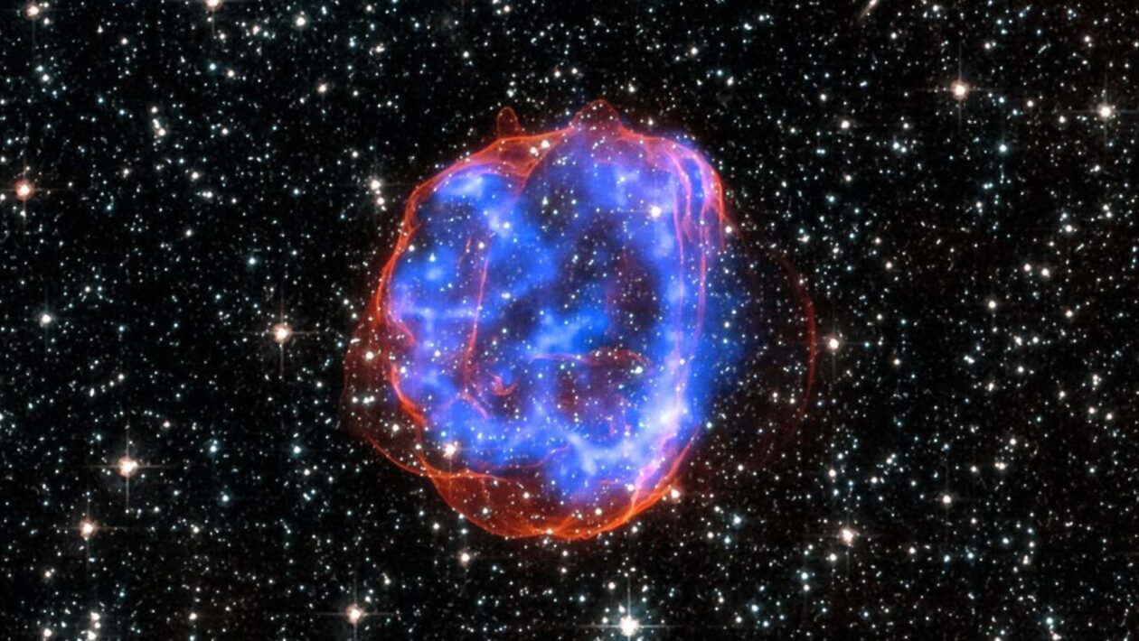 Vestígios da supernova SNR E0519-69.0 na Grande Nuvem de Magalhães (Imagem: NASA/CXC/Rutgers/J.Hughes; Optical: NASA/STScI)