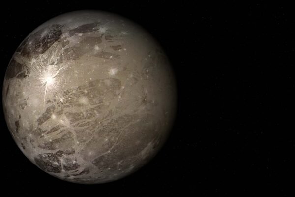 Ganimedes pode esconder oceanos subterrâneos capazes de sustentar vida extraterrestre microscópica. (Imagem: Getty Images via Canva)