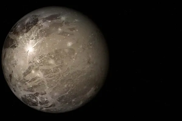 Ganimedes pode esconder oceanos subterrâneos capazes de sustentar vida extraterrestre microscópica. (Imagem: Getty Images via Canva)